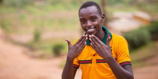 Deaf Child signing 'thank you'