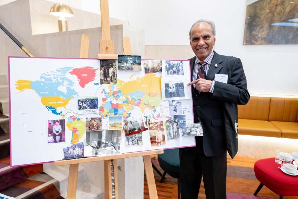 Peter pointing to a picture from his VSO placement