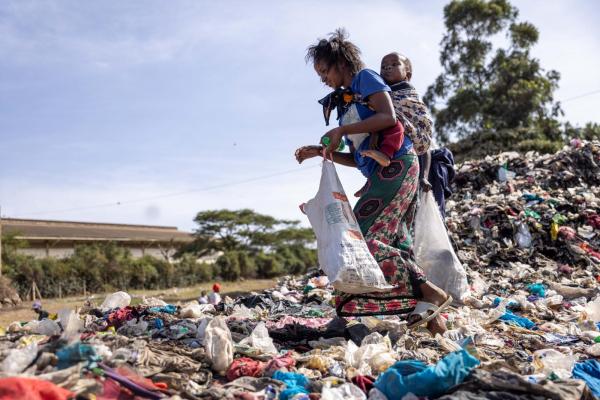 Woman picking waste