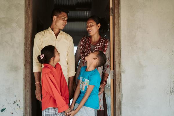 Puja and Laxman with their family