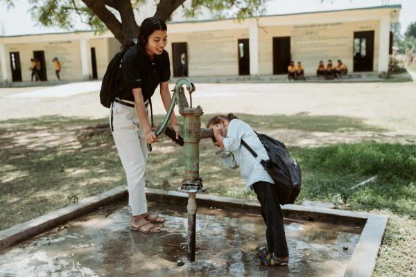 People using water pump